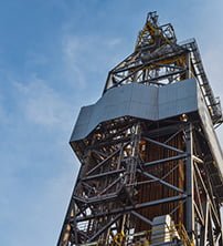 close up picture of a tower created from pipes